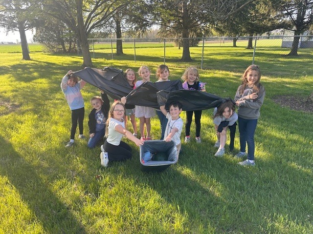 showing the trash they picked up