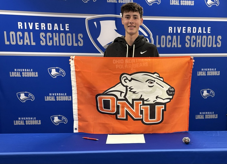 Nathan holding ONU flag