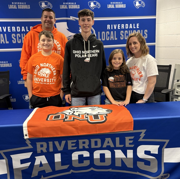 Nathan and family with ONU flag