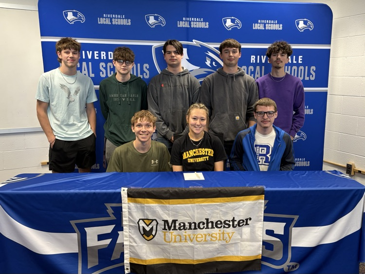 Lillian signing with friends  