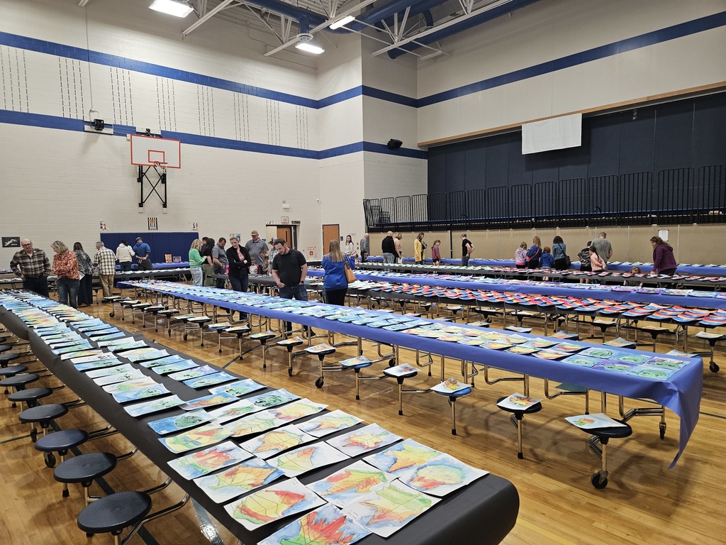 Aux gymnasium full of artwork