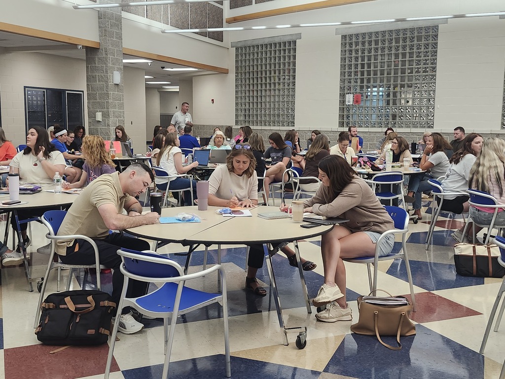 Staff members collaborating during group activity