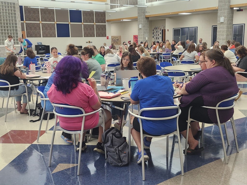 Staff members collaborating during group activity