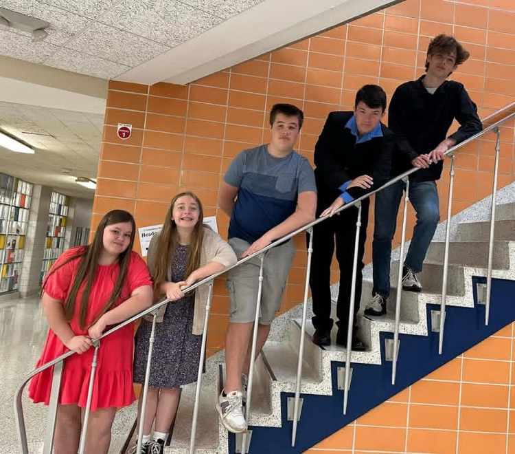QB team posing on stairs 2023