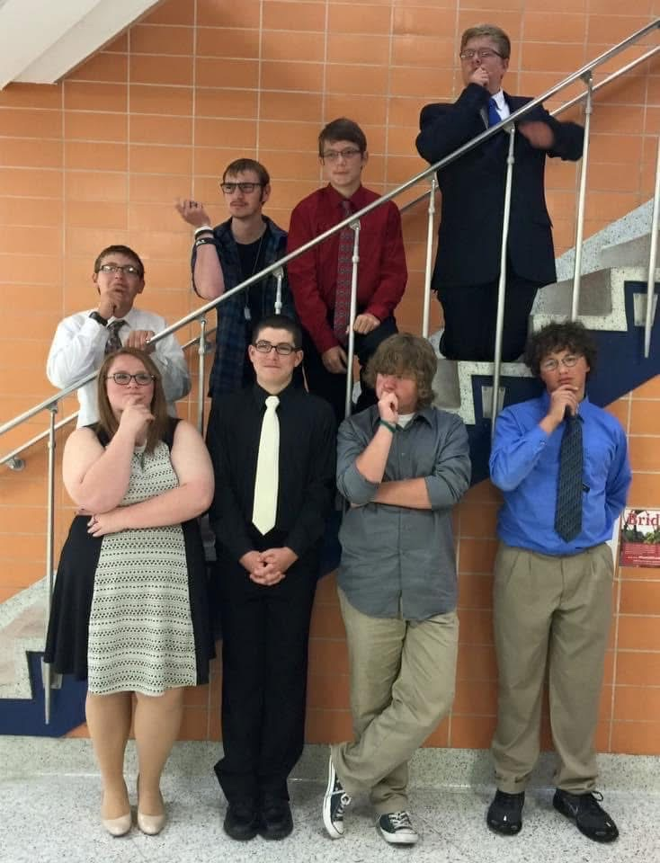 QB team posing on stairs 2015