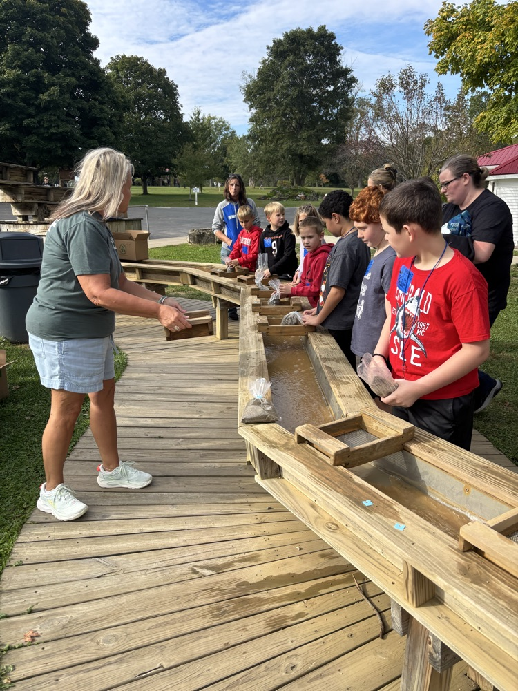 students learning about gem mining