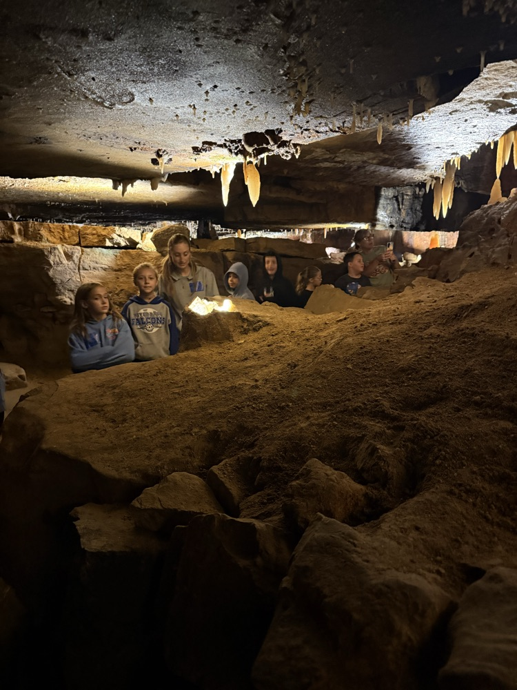 students learning about the caverns