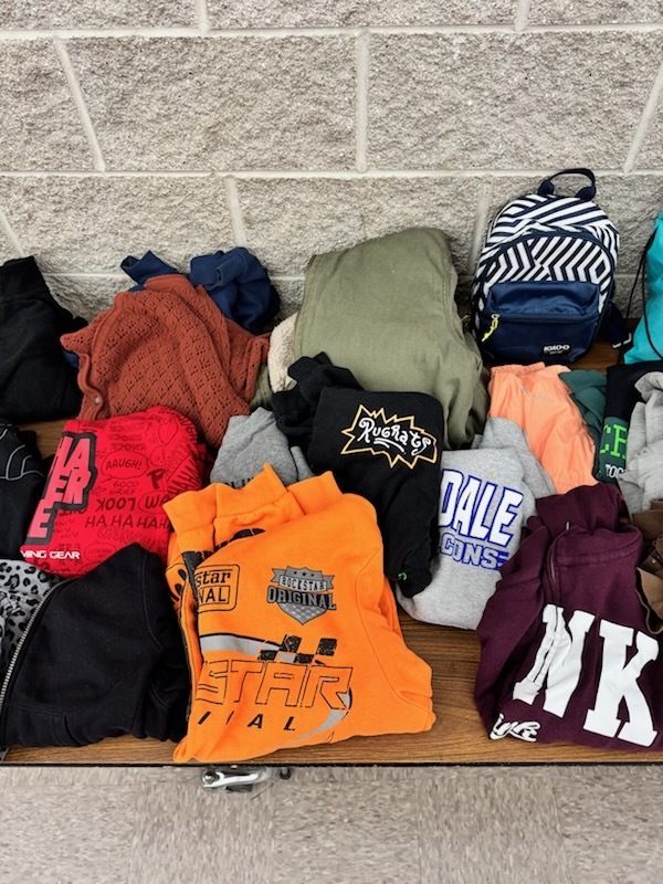 Tshirts , pictures of the lost and found table