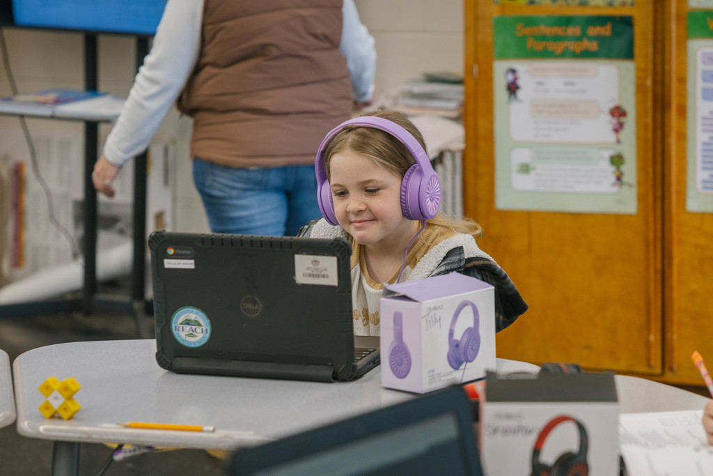 student on chromebook