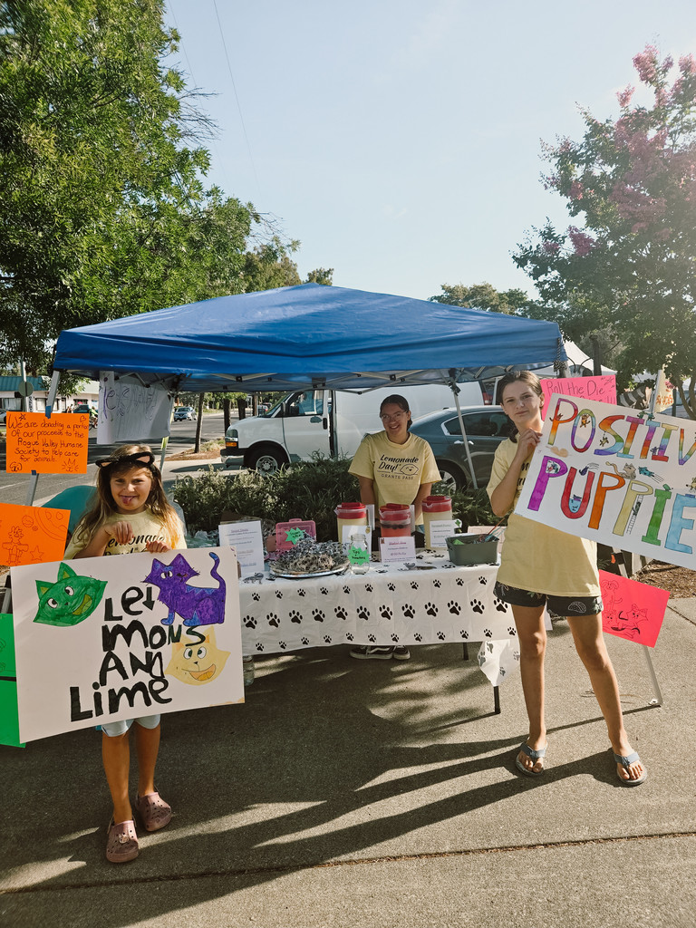 kids holding signs