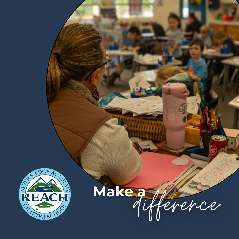 A teacher reads to her class of elementary-aged children from her desk. 