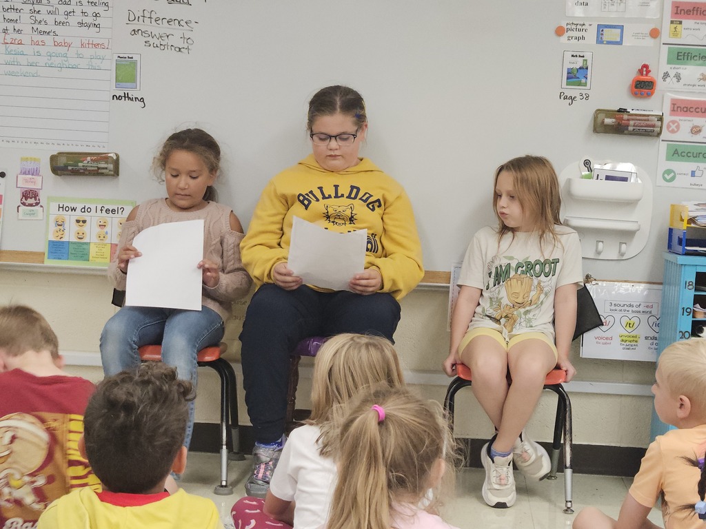 2nd graders reading stories
