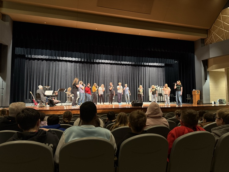 Jazz choir performing for 5th grade