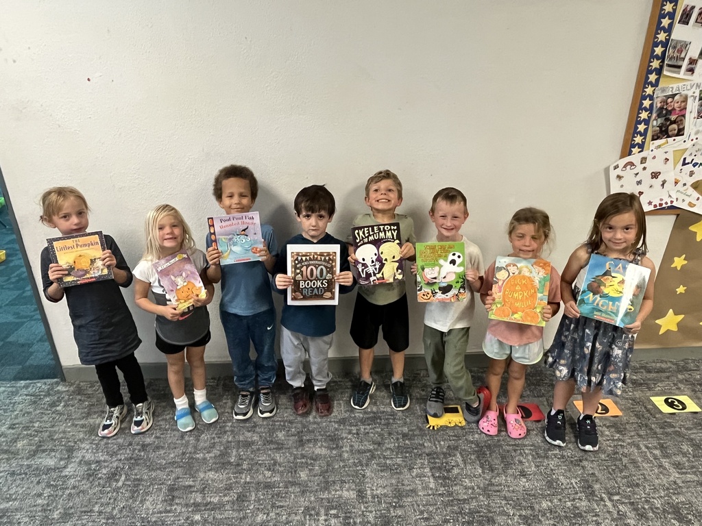 class holding books
