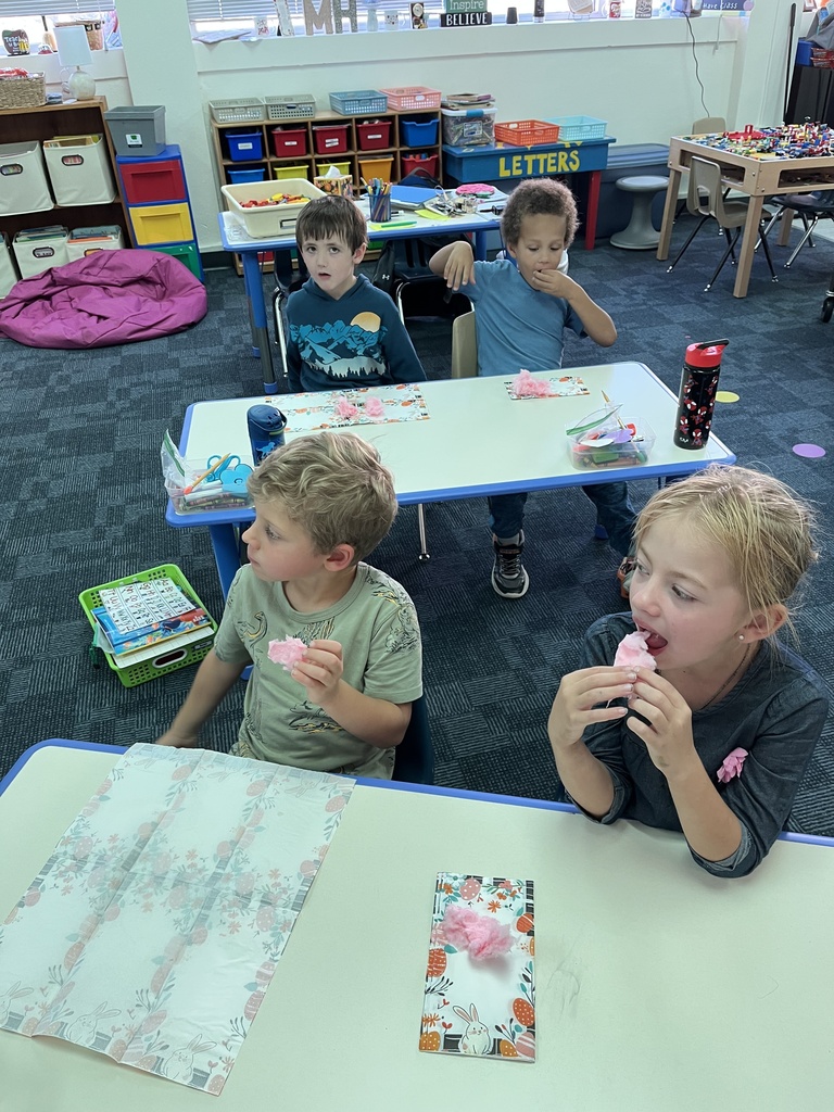 4 students eating cotton candy
