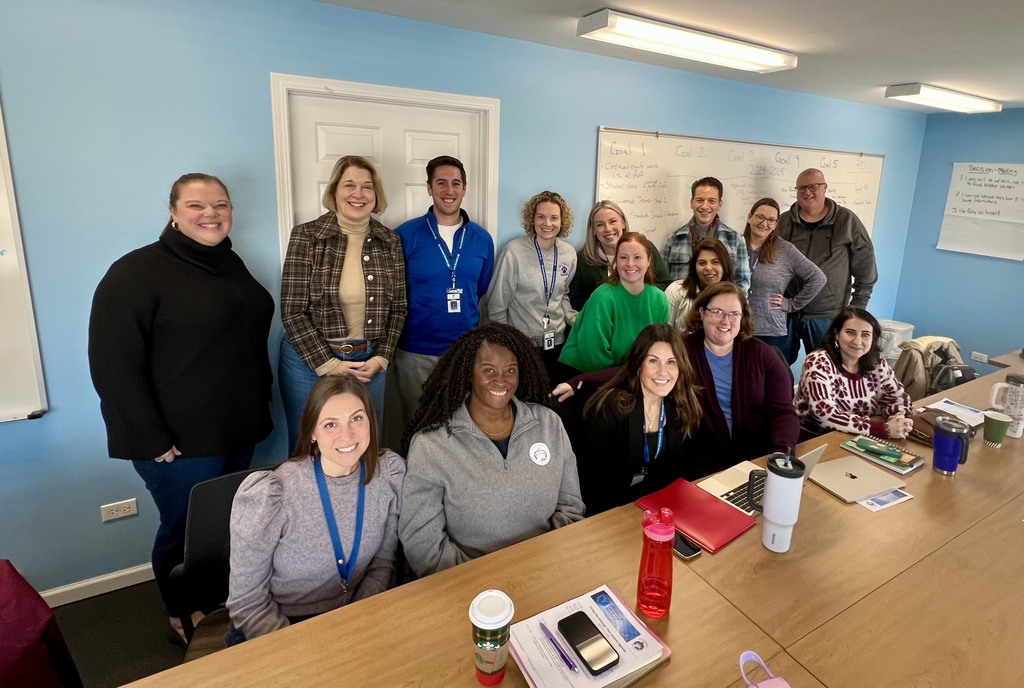 strategic plan committee seated at a table