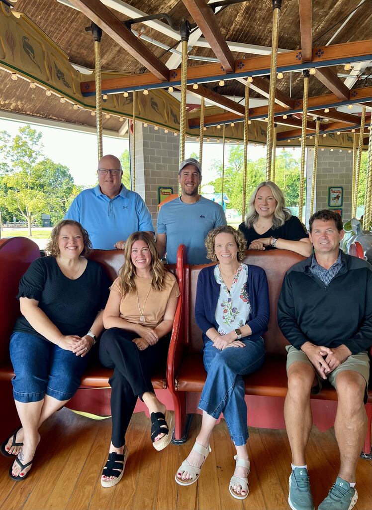 building leaders on zoo carousel