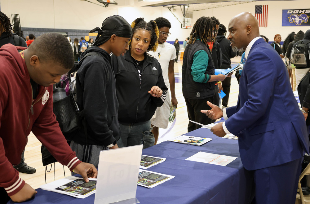 Project Manhood summit. Vendor speaking with RGHS students