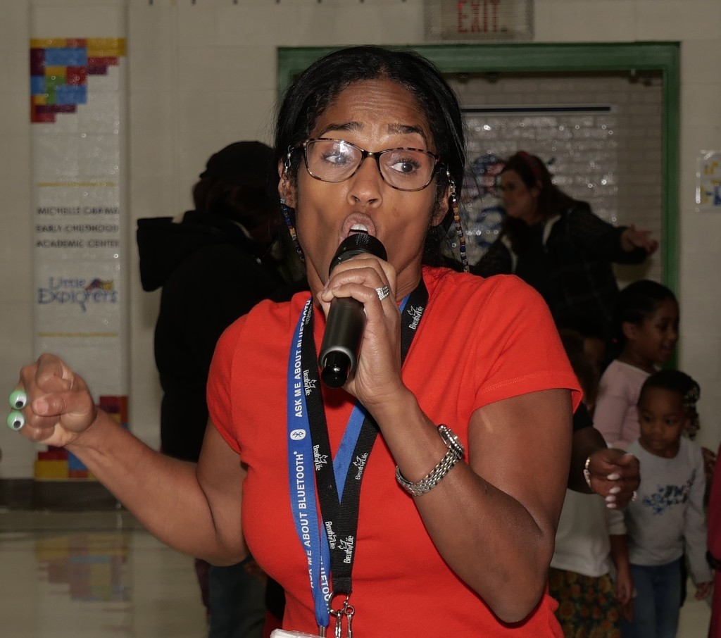 Teacher singing karaoke.