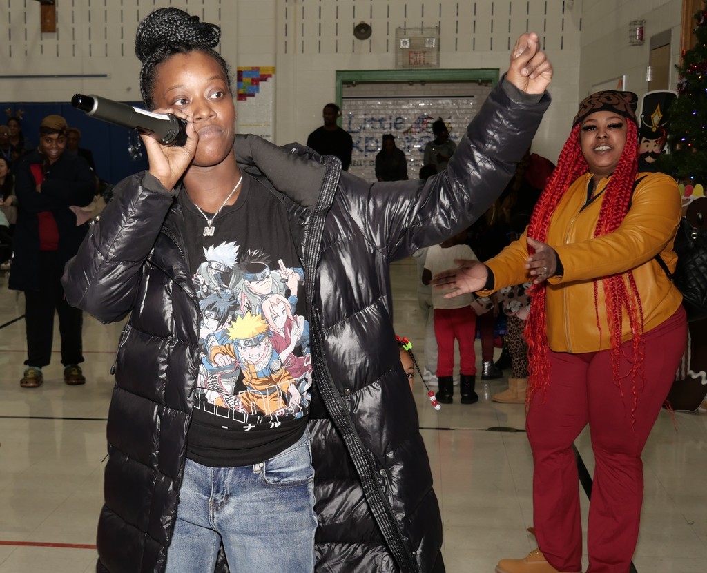 Mom singing karaoke.