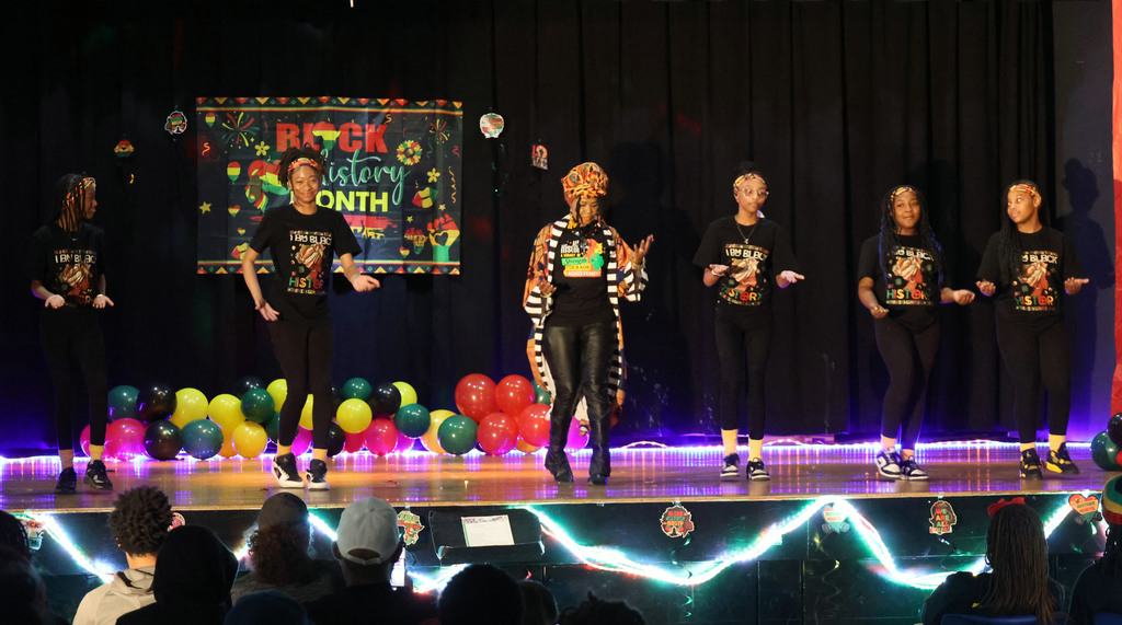 Dancers wearing Black History Month themed attire