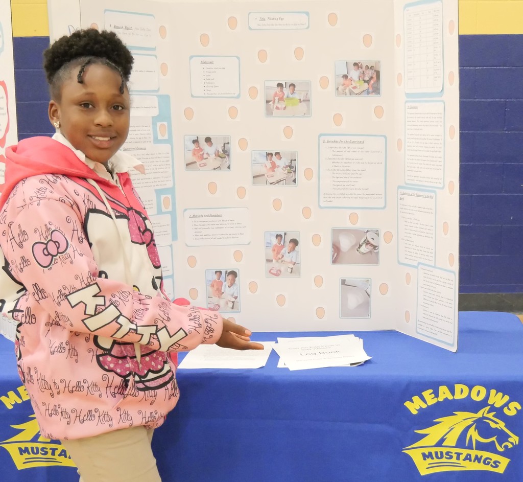 Scholar presenting work at Districtwide STEAM Night. 