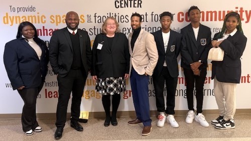 RGHS scholars at 2026 DECA Competition with RGHS alumni. 