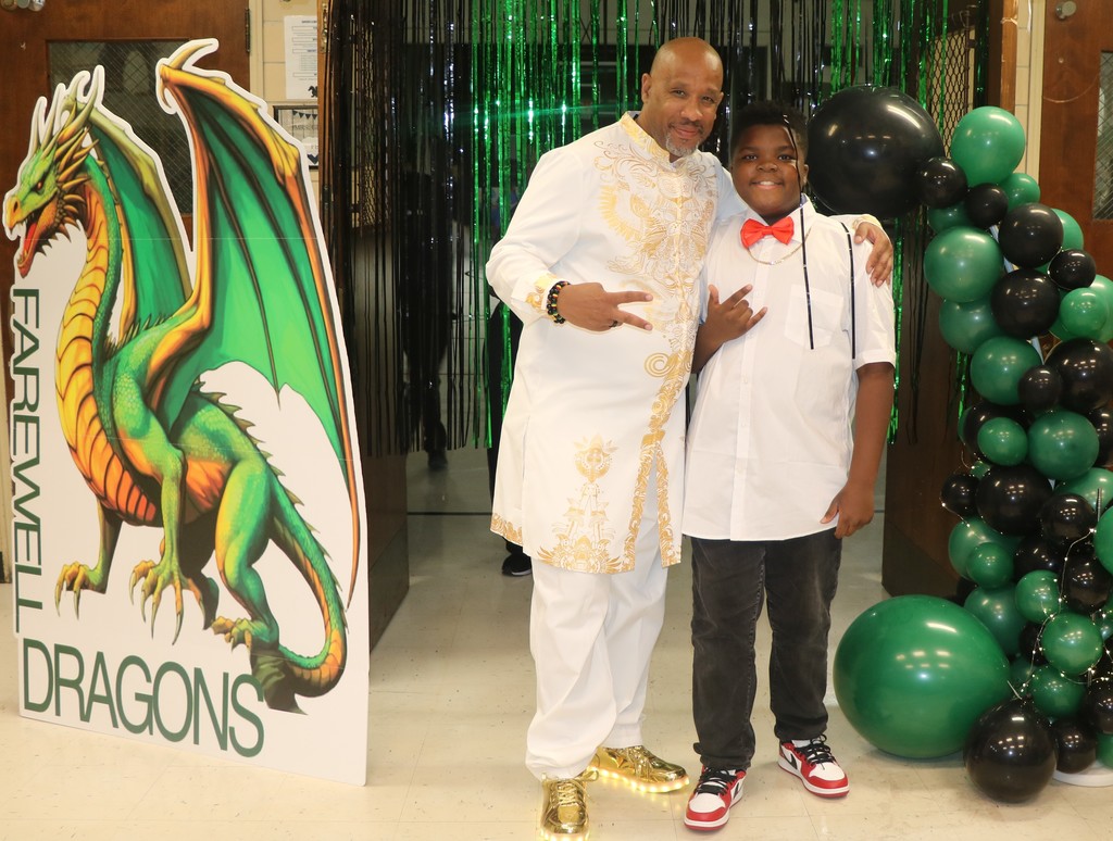 Principal Dominic Lenoir and scholar at Danforth ES Sneaker Ball