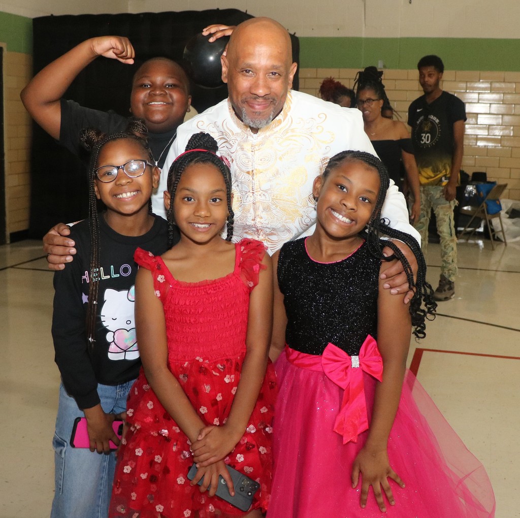 Principal Dominic Lenoir and scholars at Danforth ES Sneaker Ball
