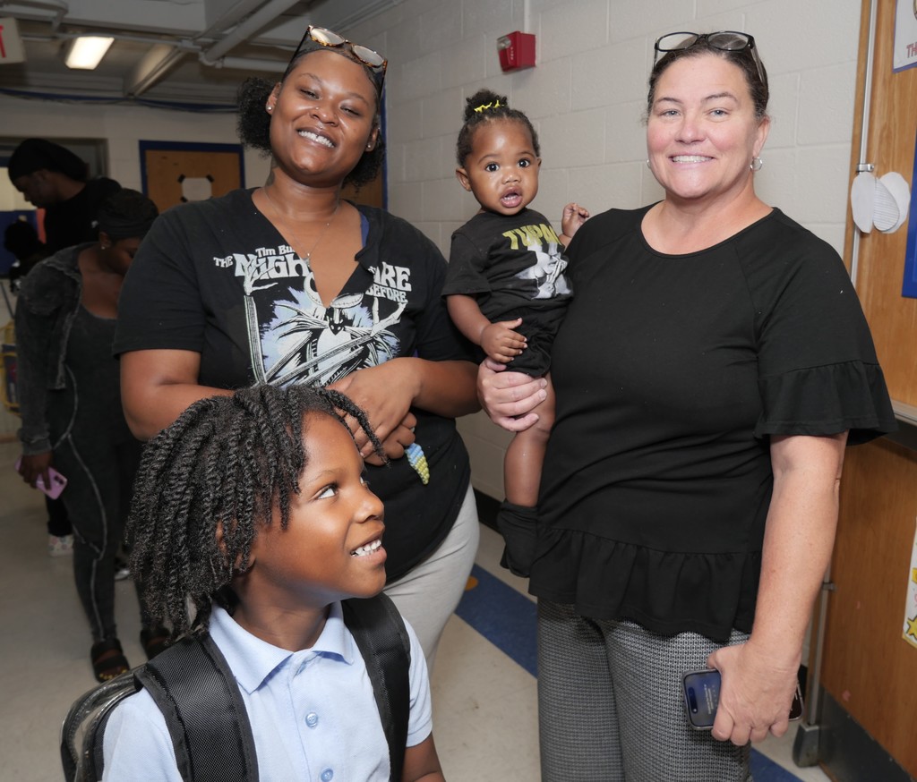 Meadows Elementary School Principal Windy Winfield, scholar and family. 