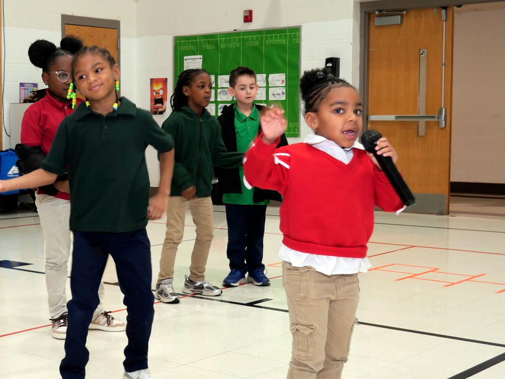 Reading with Rappers Assembly at Gibson