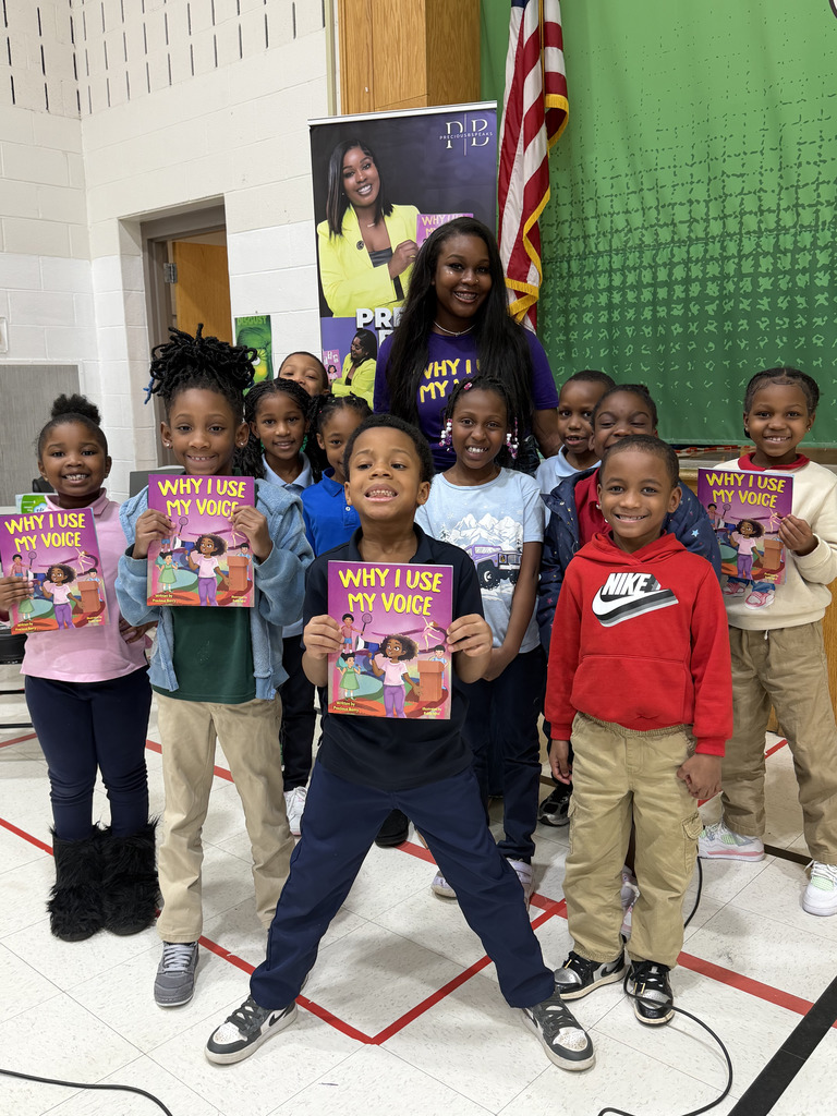 Precious Barry reads to RGSD scholars for Read Across America week. 
