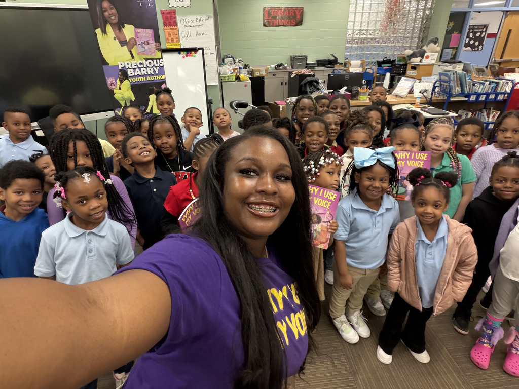 Precious Barry reads to RGSD scholars for Read Across America week. 