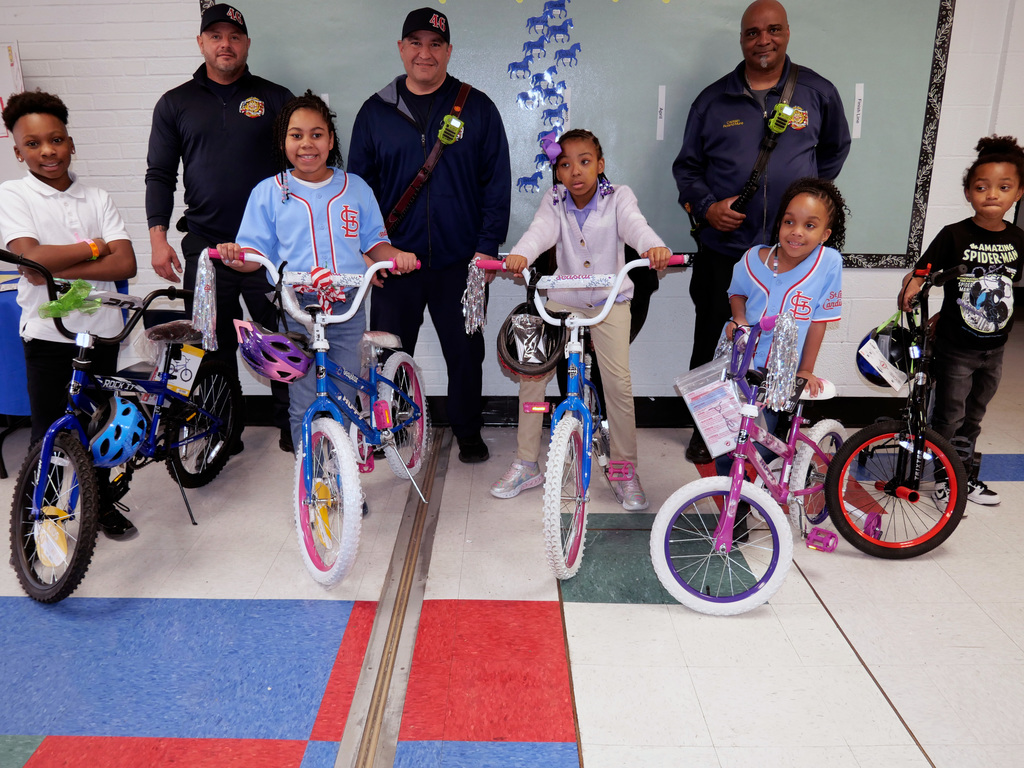 Moline Acres and Metro North Fire District Raffle Bikes for attendance