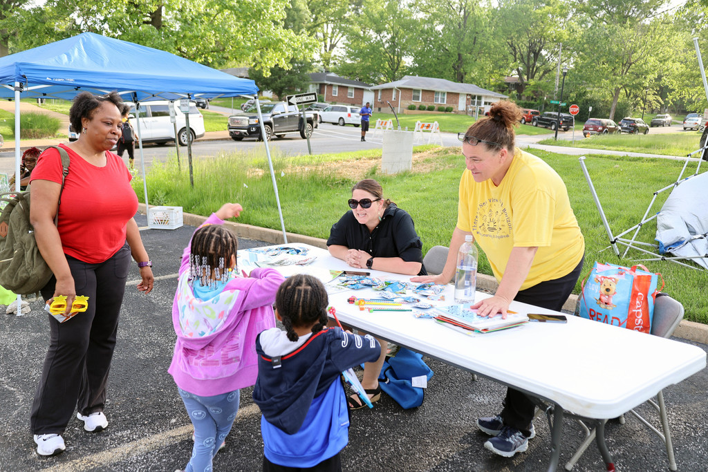 Kindergarten Roundup Kids at Table with adults
