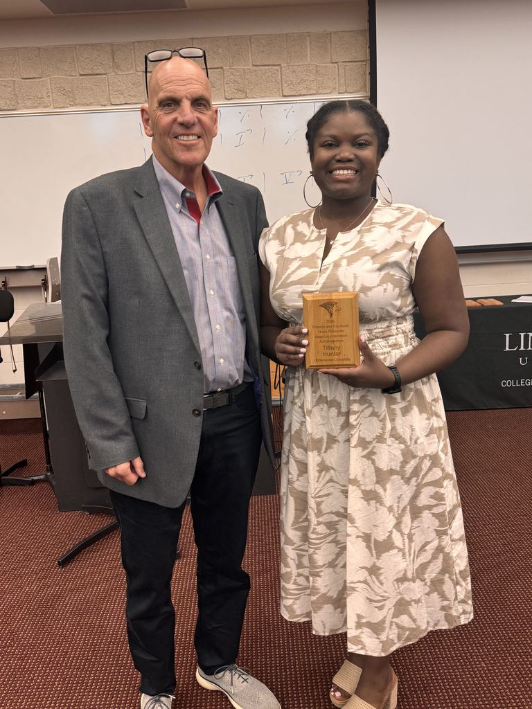 Dr. Tiffany Hunter receiving award