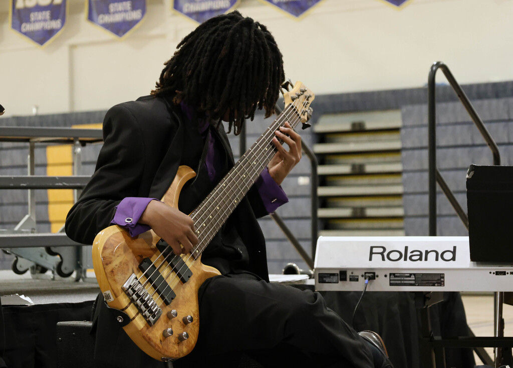RGHS student plays the guitar at the spring concert