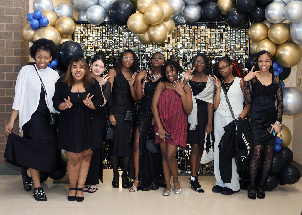 A group of female Westview Middle School students post for photo