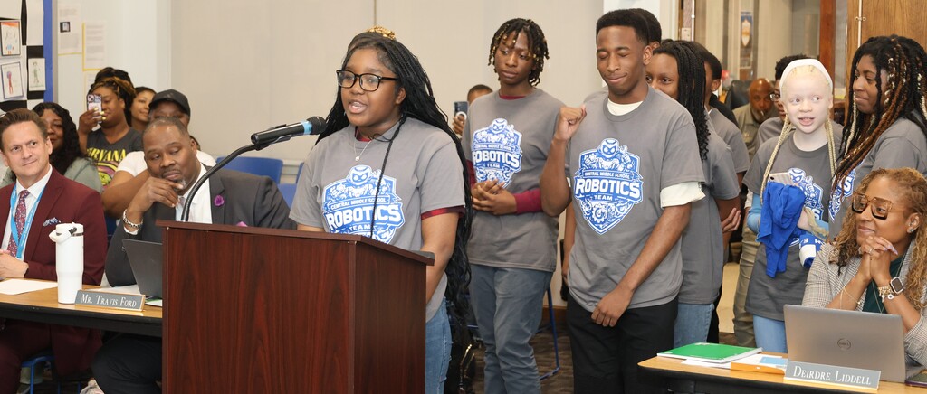 Central Middle School's Robotics Team and Coach Cheryl Howard receive the Riverview Excellence Award from the Board of Education. 