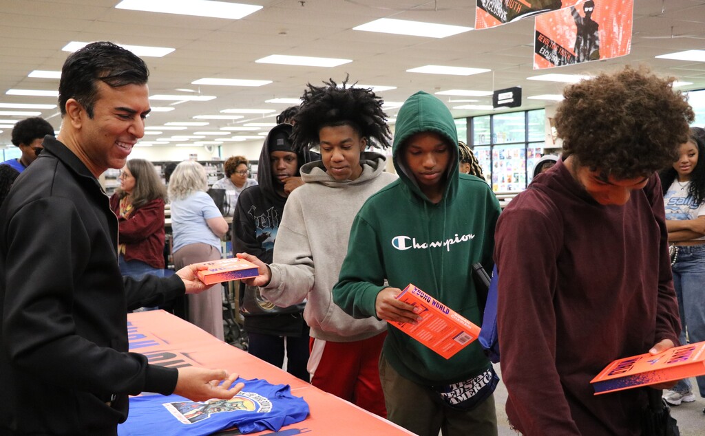 RGHS welcomed author Soman Chainani for his 'Young World' book tour. The author signed copies of his book and gave them away to RGHS scholars. The  harrowing story takes place in St. Louis, MO!