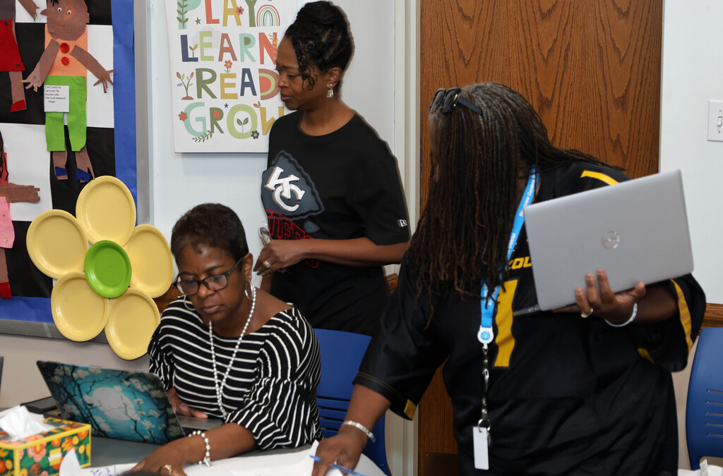 Dr. Tanya Patton speaks with Dr. Tiffany Fane while Nikki Loyd is in the background