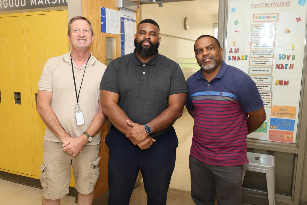 Three male Westview Middle School staff members posing and smiling