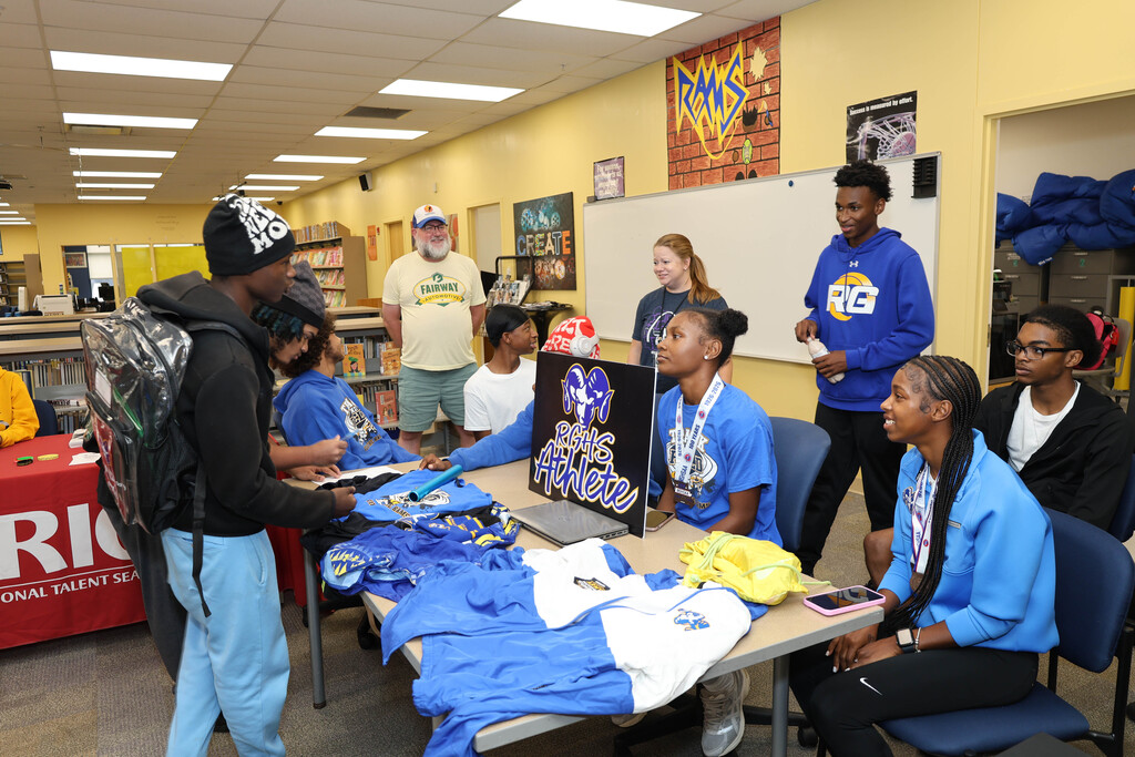 Riverview Gardens High School school athletics table at freshman orientation