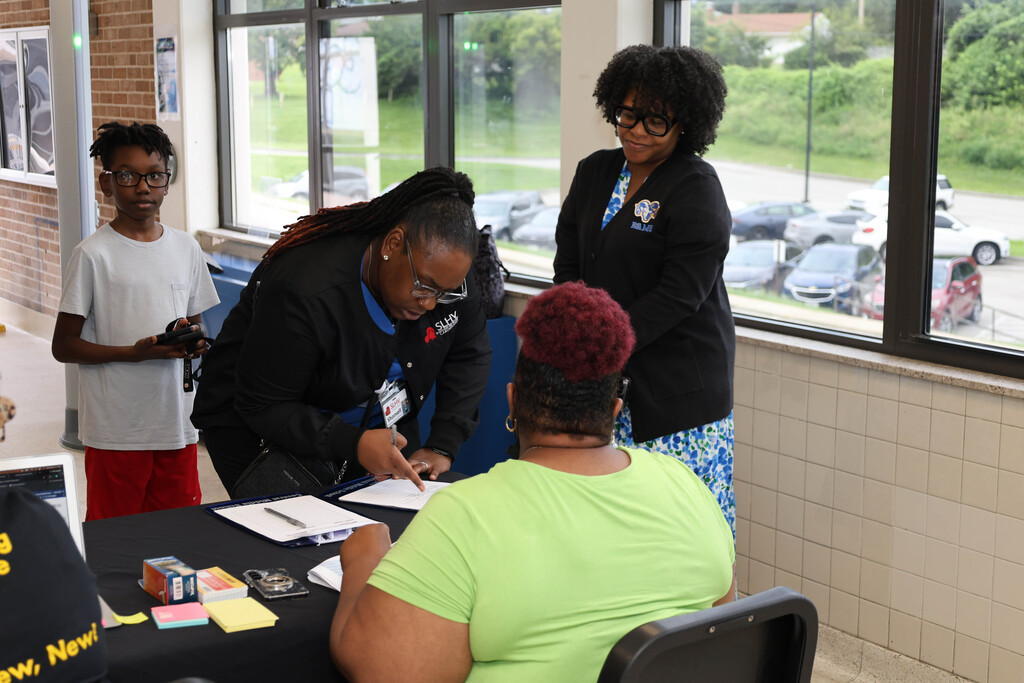 Parent signing in at CMS Meet the Teacher Night
