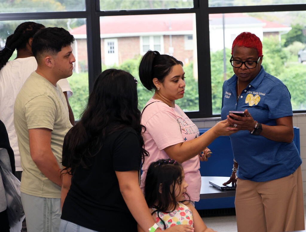 Central Middle School principal Rachel Clark speaks to family