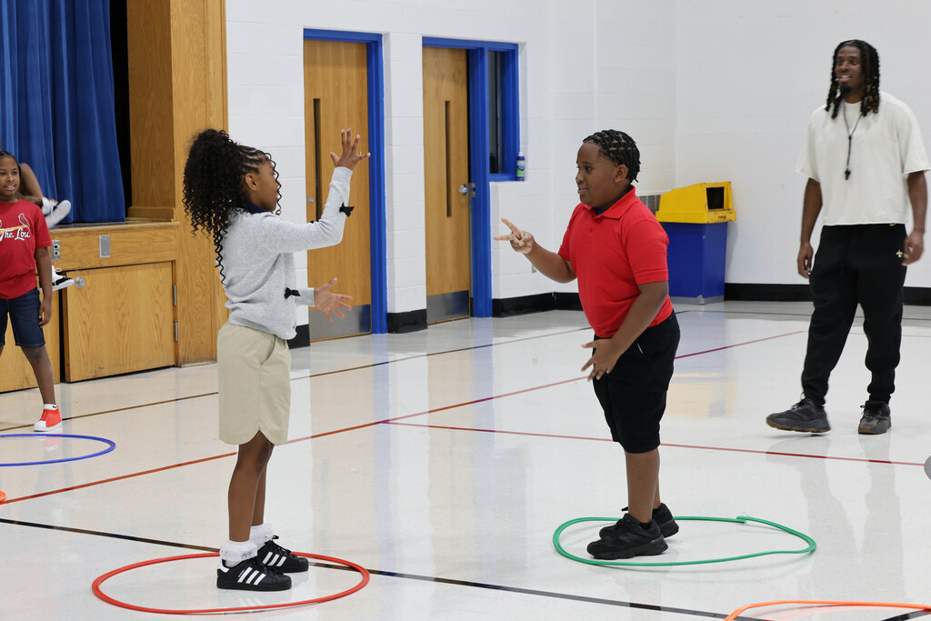Students playing Rock, Paper, Scissors