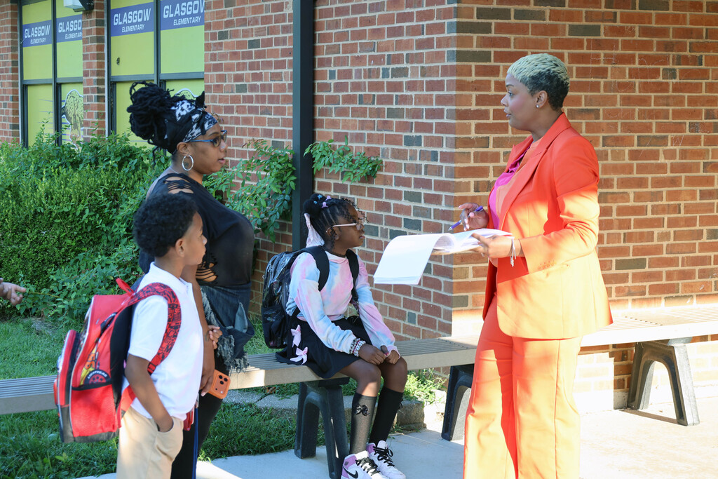 Principal Kasia Landa speaking to a parent
