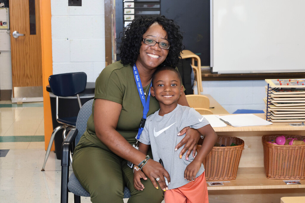 Michelle Obama ECAC teacher and student pose