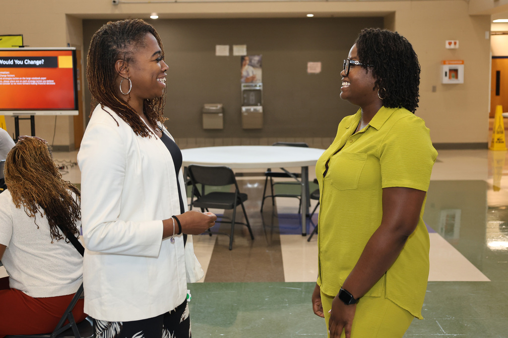 Jarita Williams and Dr. Tiffany Hunter talking and smiling