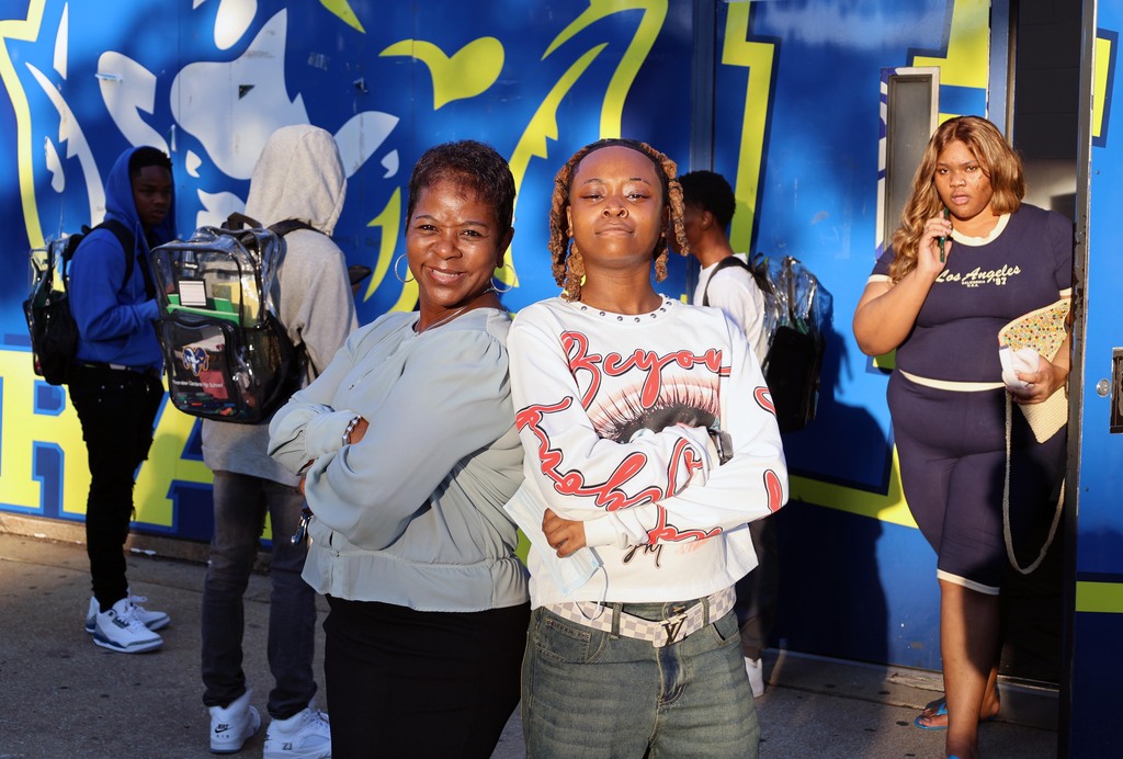 Dr. Tanya Patton poses with student